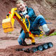 Екскаватор Rolly Toys rollyDigger CAT желтый 513215