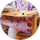 BabyOno нагрудник-фартук с длинным рукавом "Цветочный сад" (74х36 см) 1476/01bo